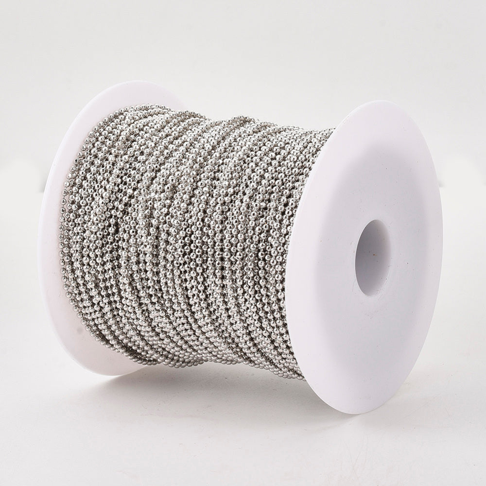 Ball chain on a spool on a white background