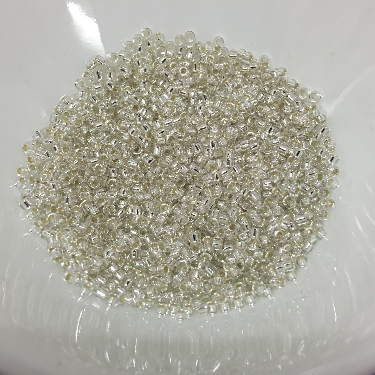 15/0 (#34) Silver (Clear) Silverlined - 10g Tube