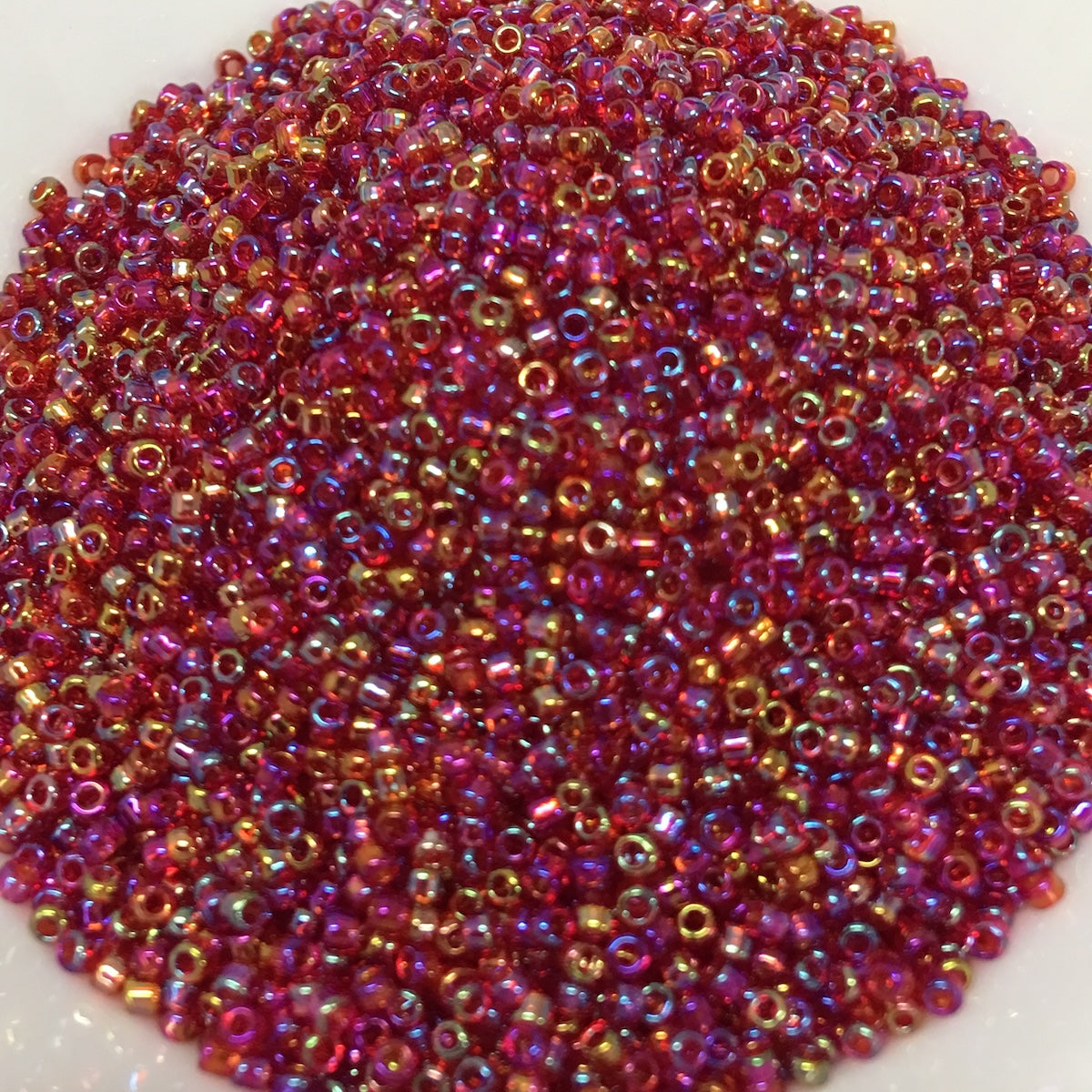 15/0 (#558r) Ruby Rainbow - 10g Tube