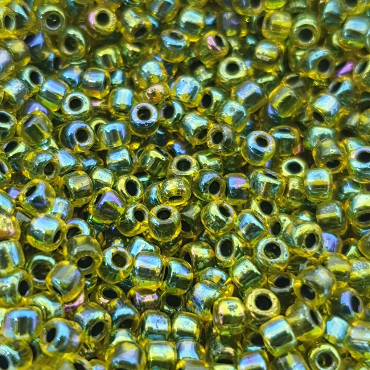 8/0 (#534/1) Amber Lined Yellow Rainbow - 22g Tube