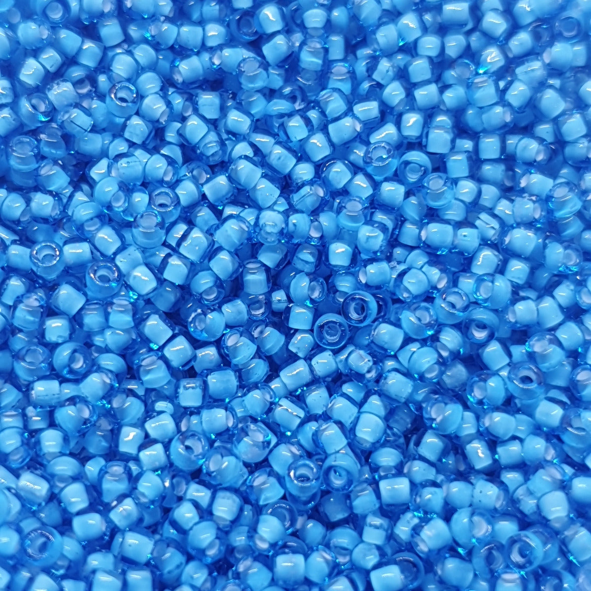 12/0 (#15/218) White Lined Aqua - 24g Tube