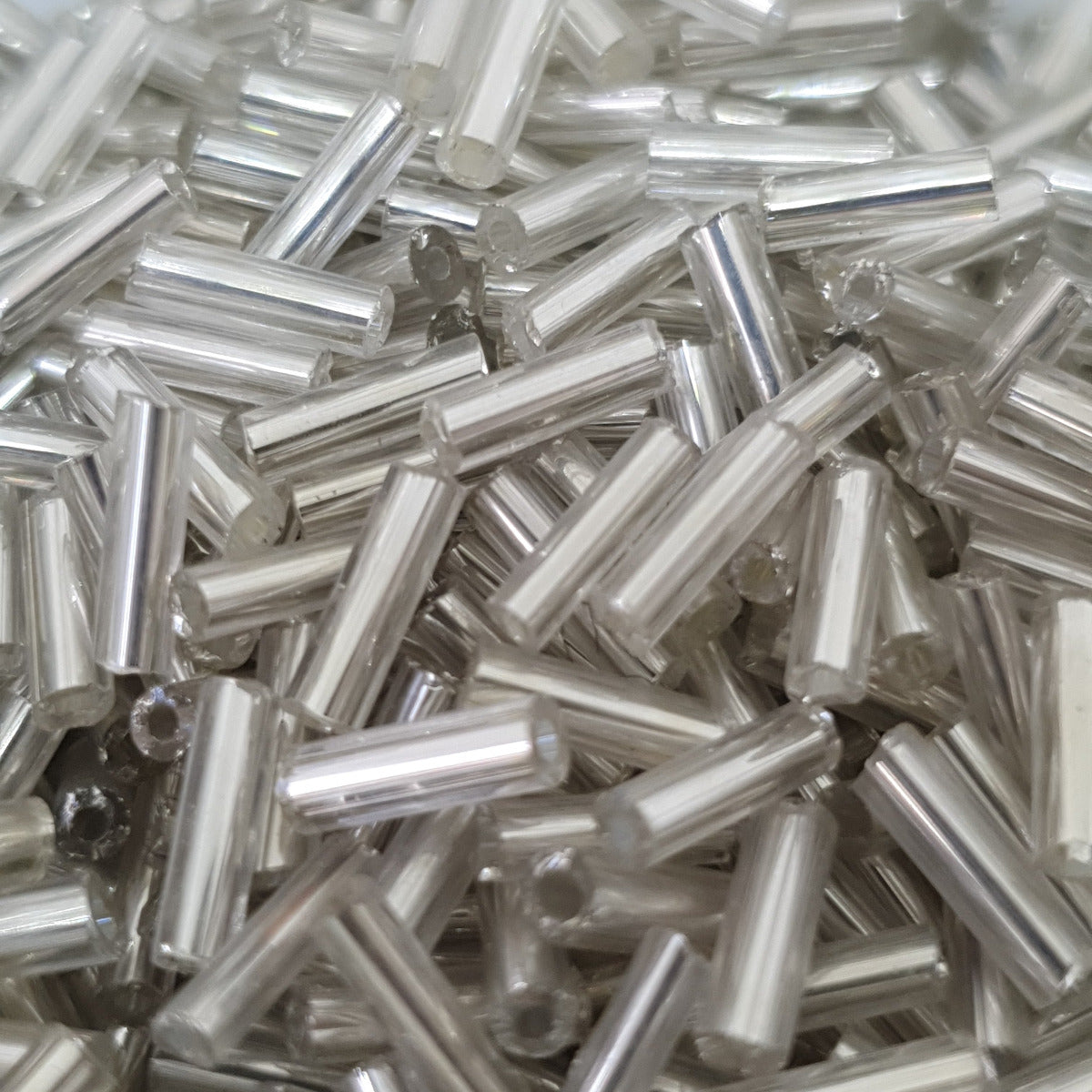 Clear - 6mm Silverlined (50g) - Bugle Seed Beads