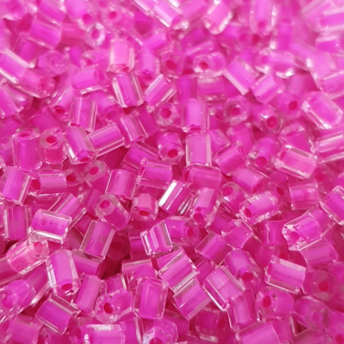 Dark Pink - (2-cut) 2mm Inside Lined Transparent (50g) - Bugle Seed Beads **