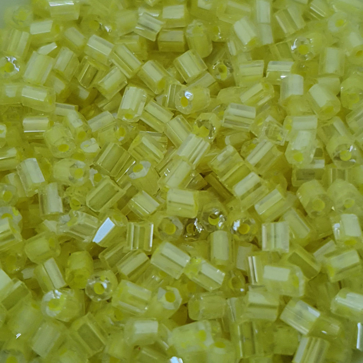 Lemon - (2-cut) 2mm Inside Lined Transparent (50g) - Bugle Seed Beads **