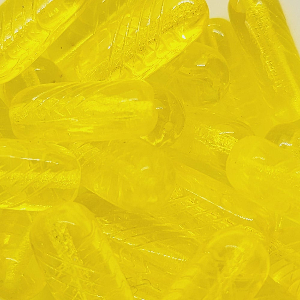 vibrant yellow clear long shape beads in a group