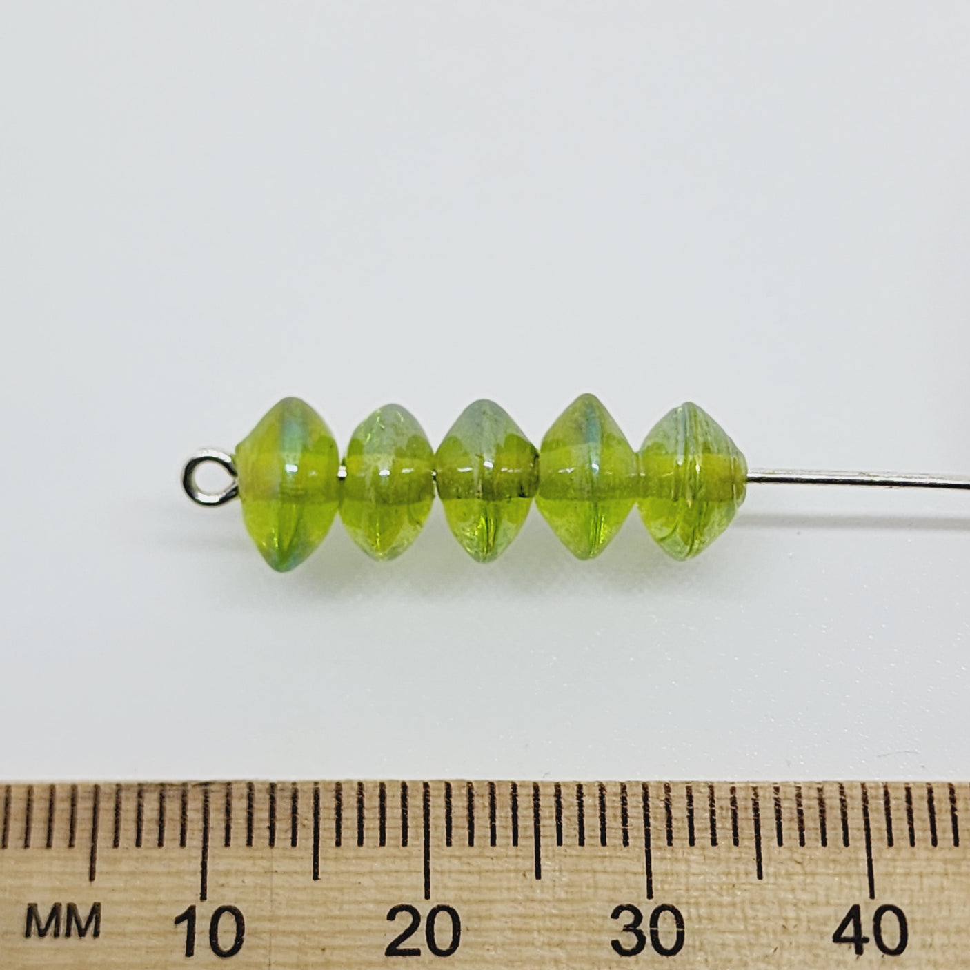 4x8mm UFO (100) - Transparent Green Lustre - Indian Glass Vintage Beads
