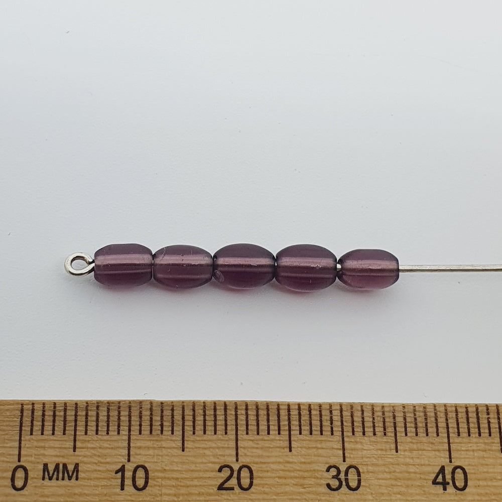 7x4mm Rice (100) - Transparent Amethyst - Glass Bead