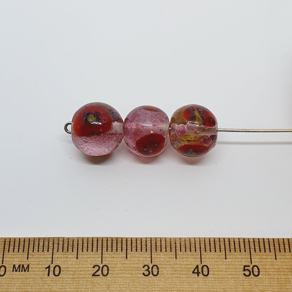 11x12mm Round (10) - Clear w. Pink Crumb - Glass Vintage Replica Trade Beads