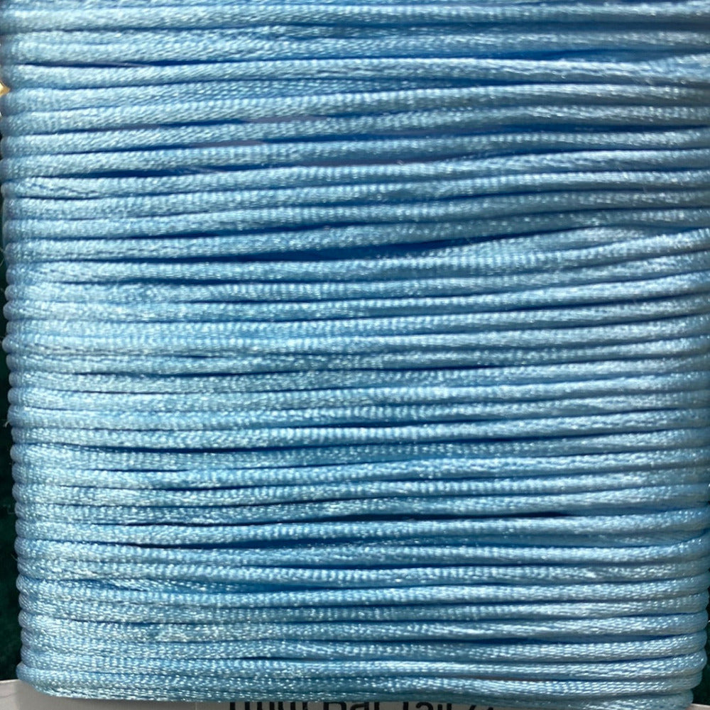 close up of 1mm light blue rat tail cord used for craft