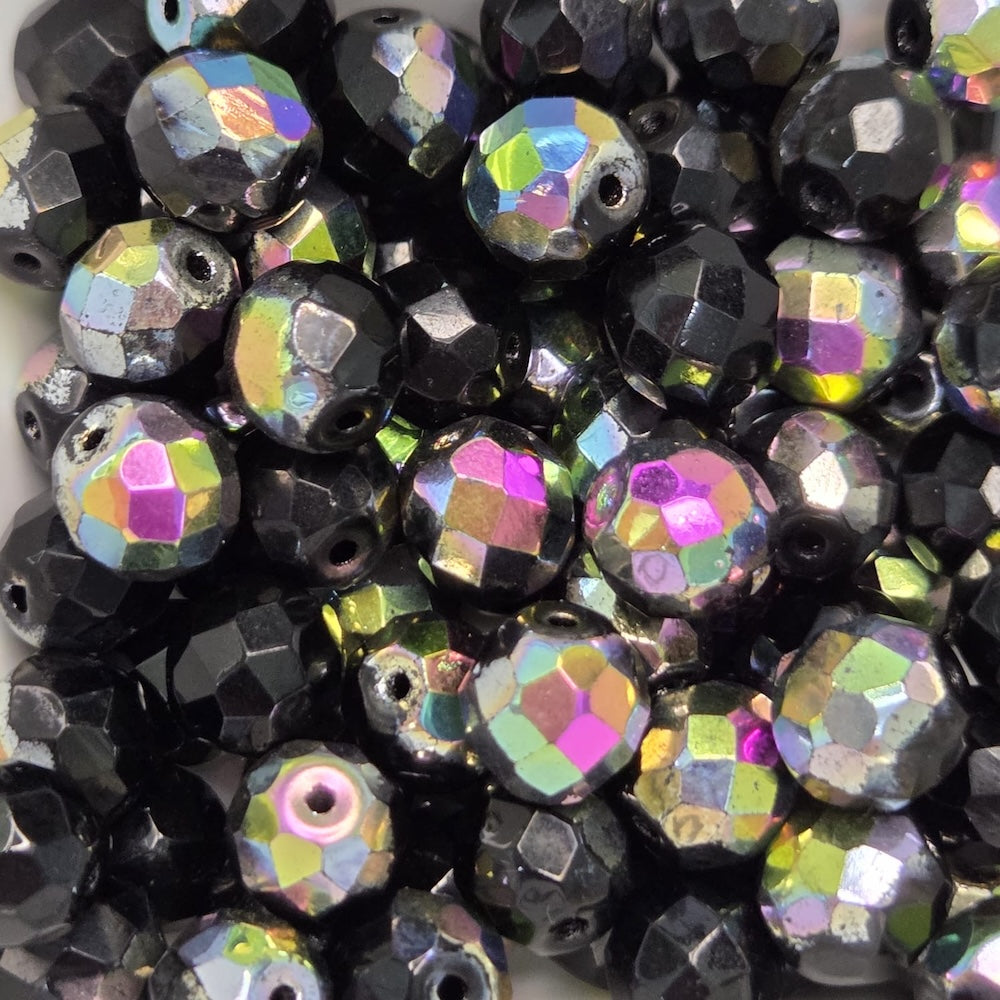 Multicolored faceted beads on a white background