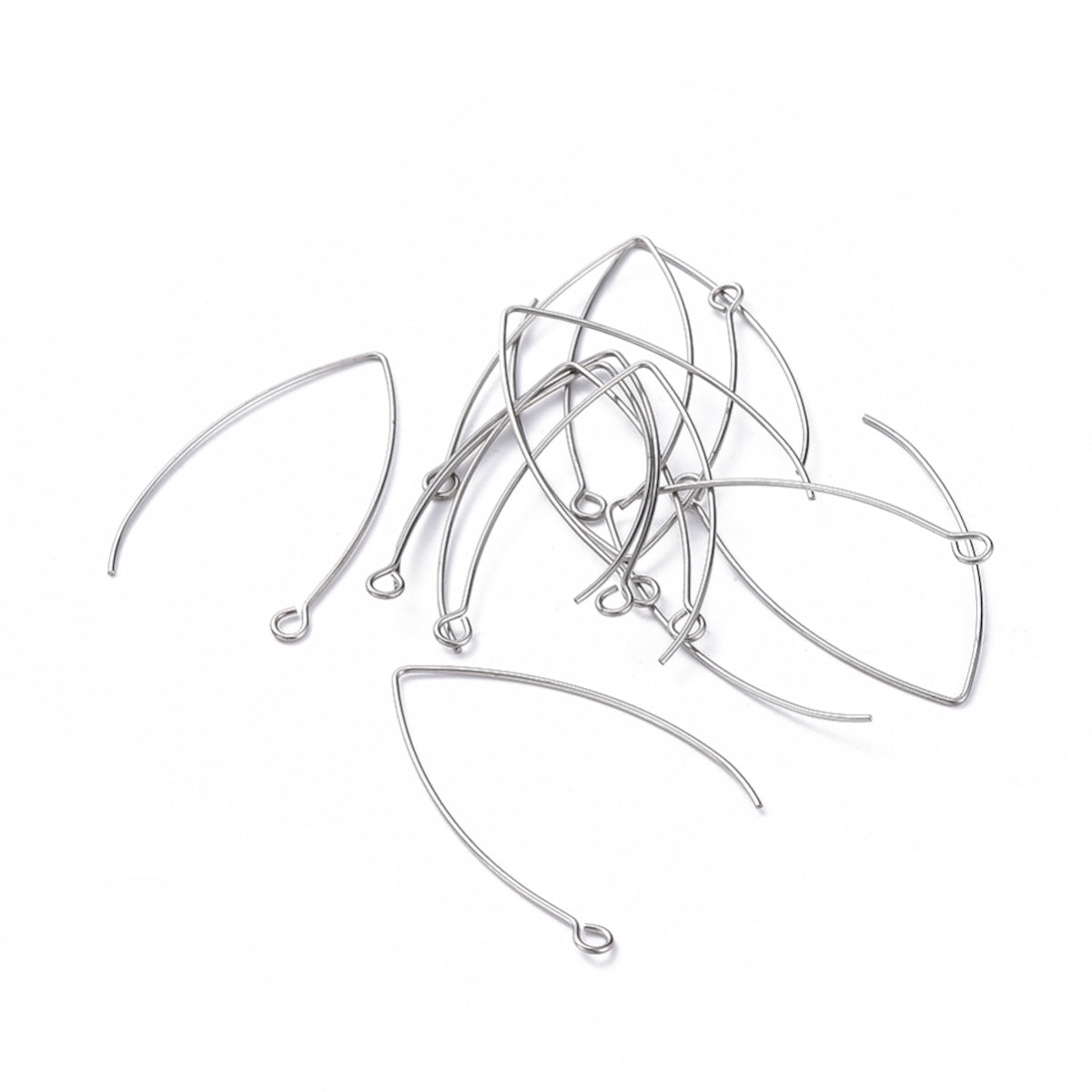 close up of a collection of large silver anti tarnish ear wires with a white background