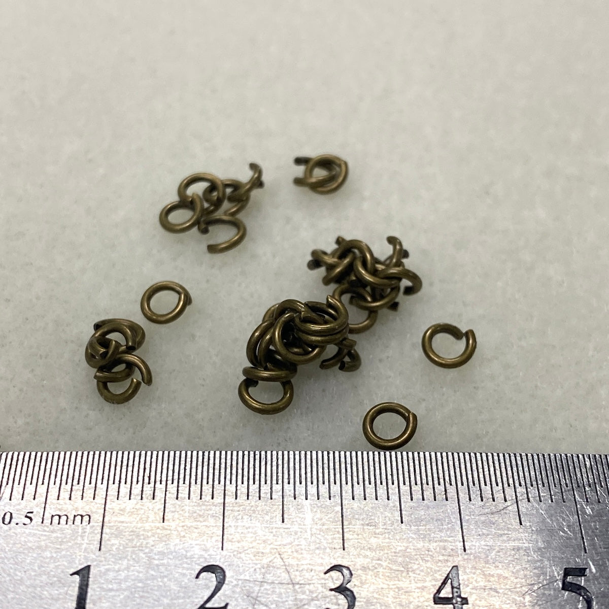 5x1mm Steel Jumpring (100) - Ancient Gold