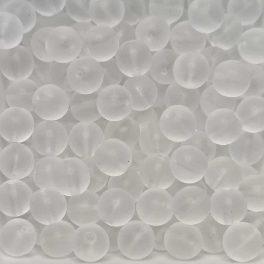matte transparent glass round beads in a group