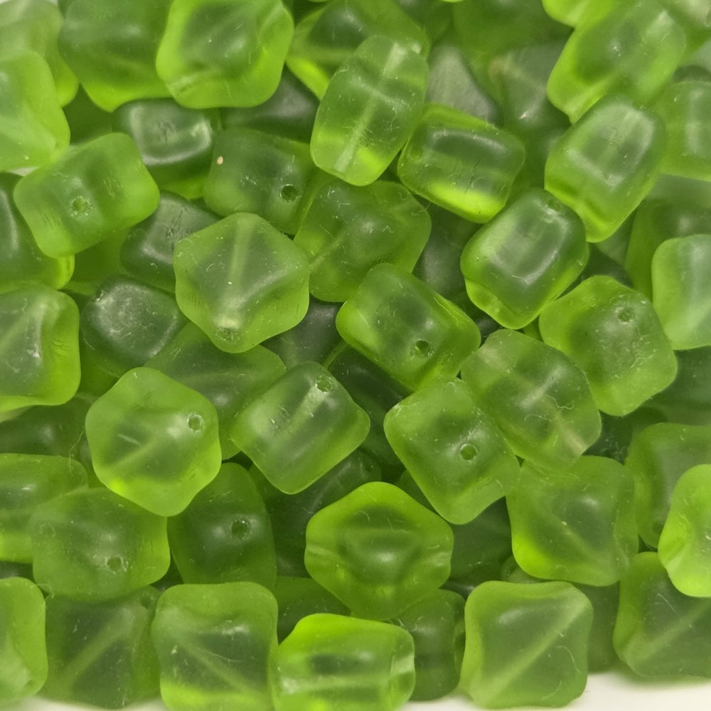 green cross square frosted beads with visible threading holes for jewelry making