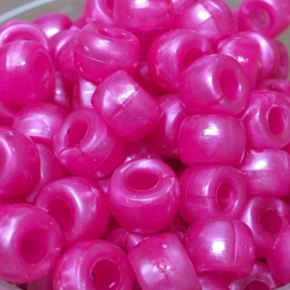 A close-up image of pearlized acrylic pony beads.