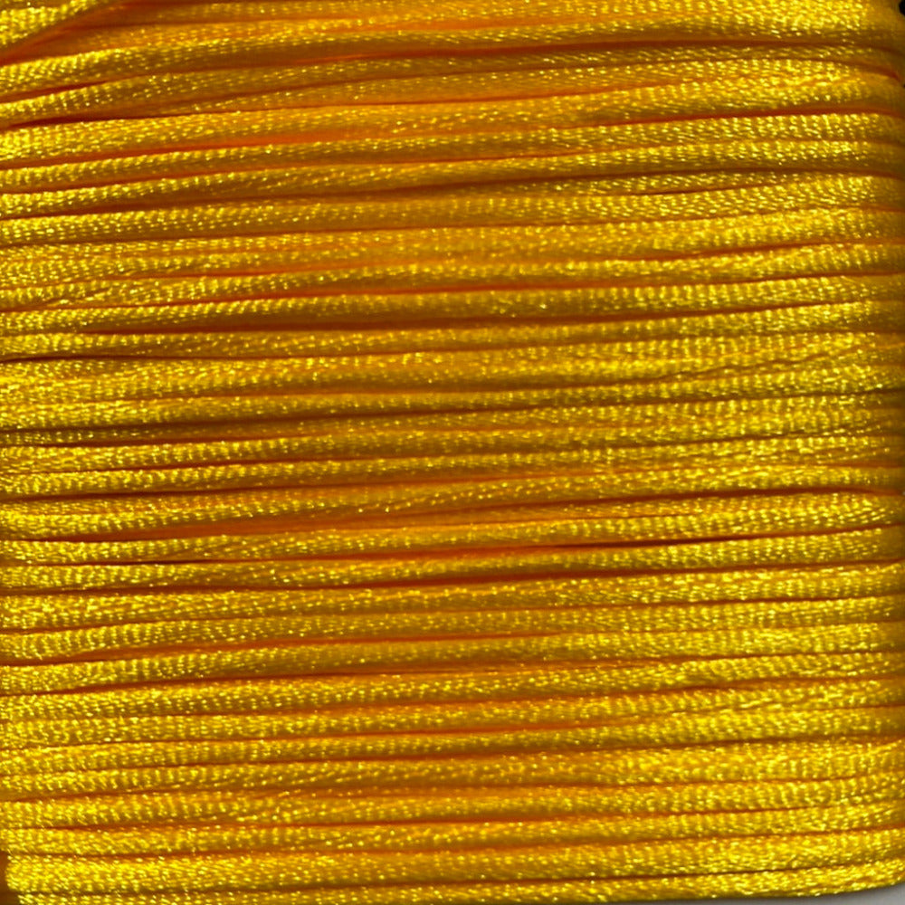 close up of golden yellow rat tail cord used for craft