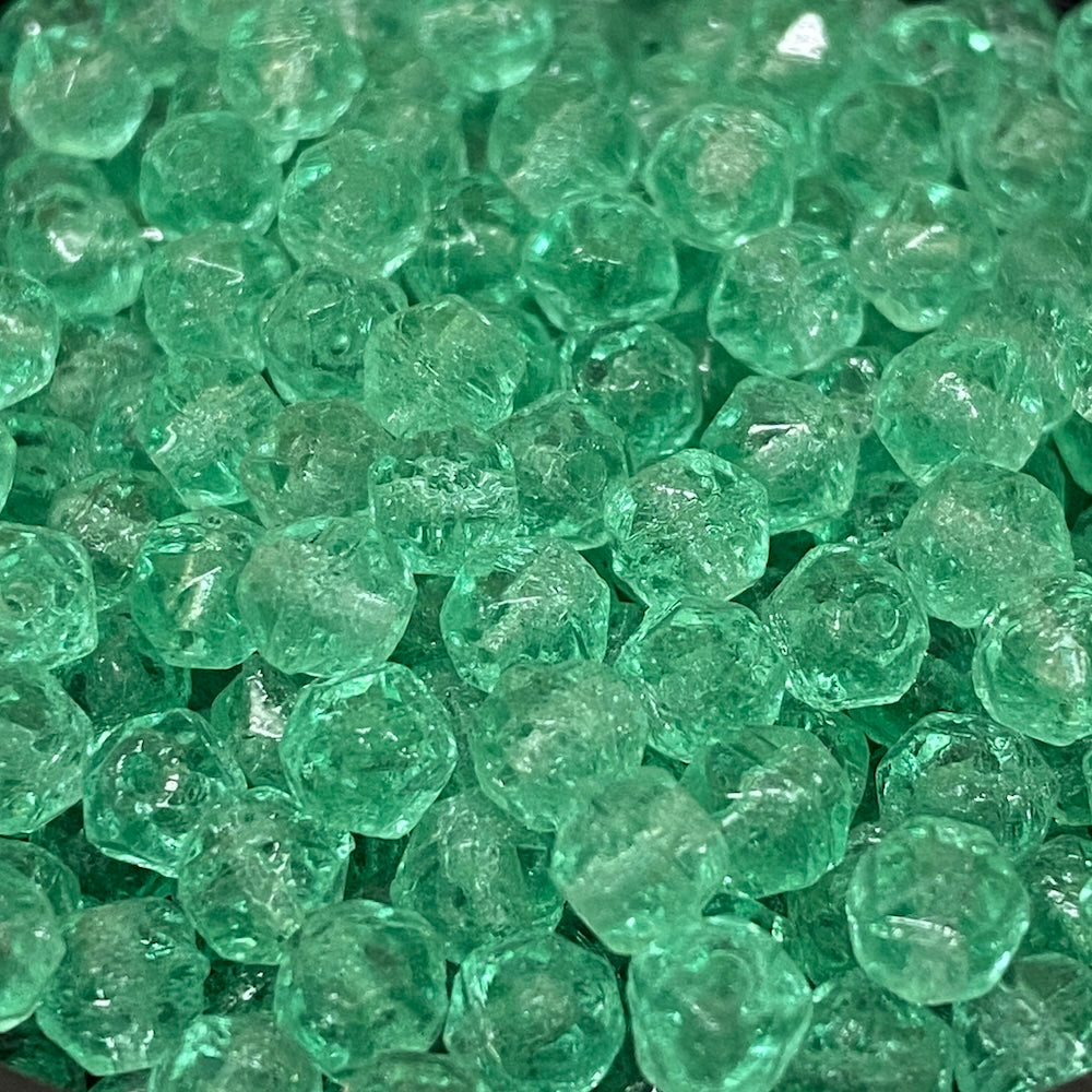Close-up of green glass beads