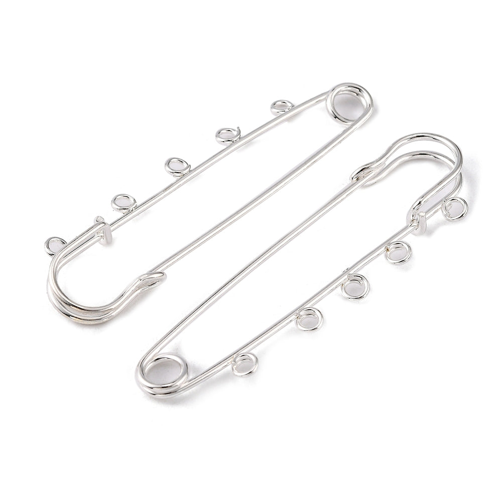 Kilt Pins in silver tone with 5 loops for threading beads and charms on a white background