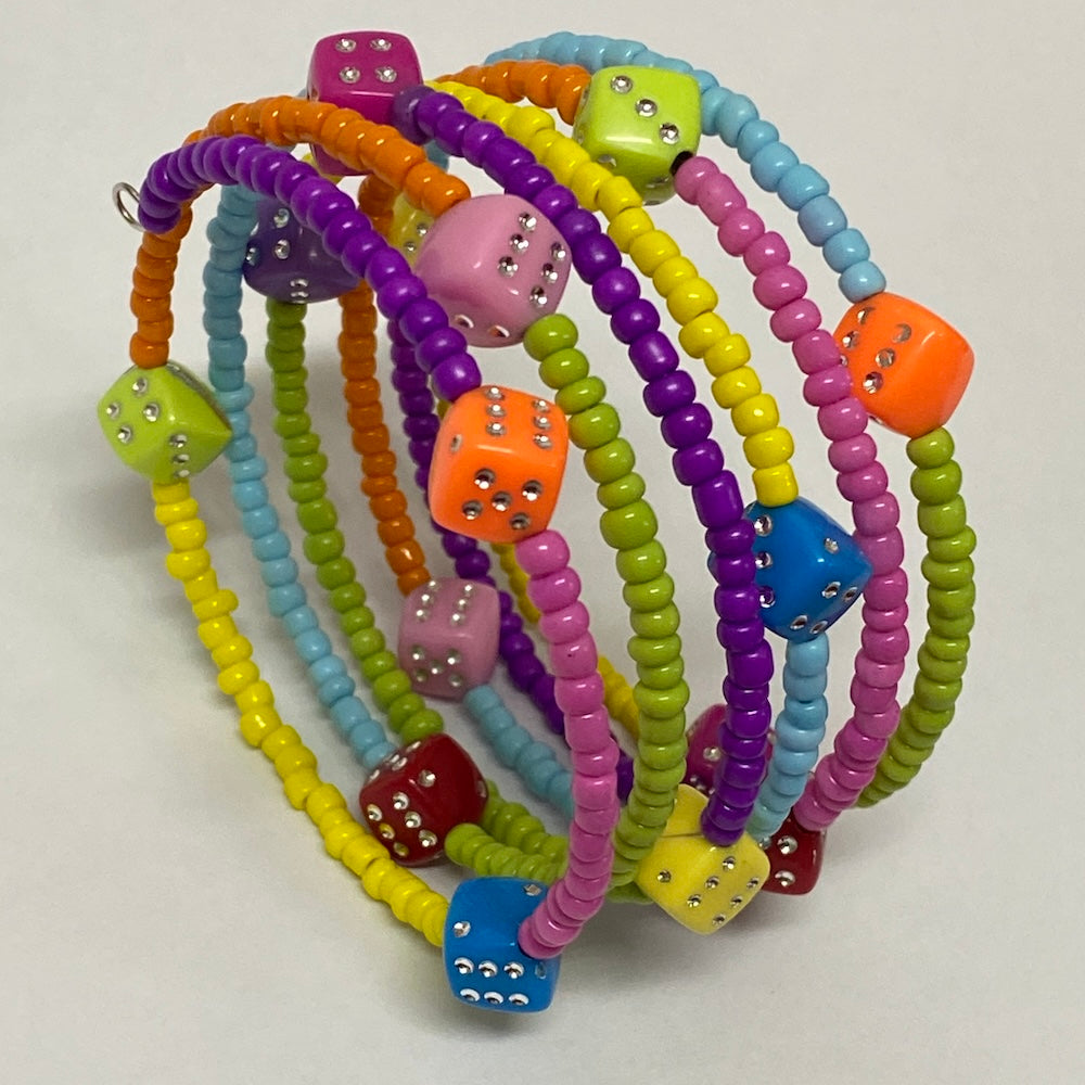 A multicolored beaded bracelet with six loops, featuring colorful seed beads and small dice-shaped beads.
