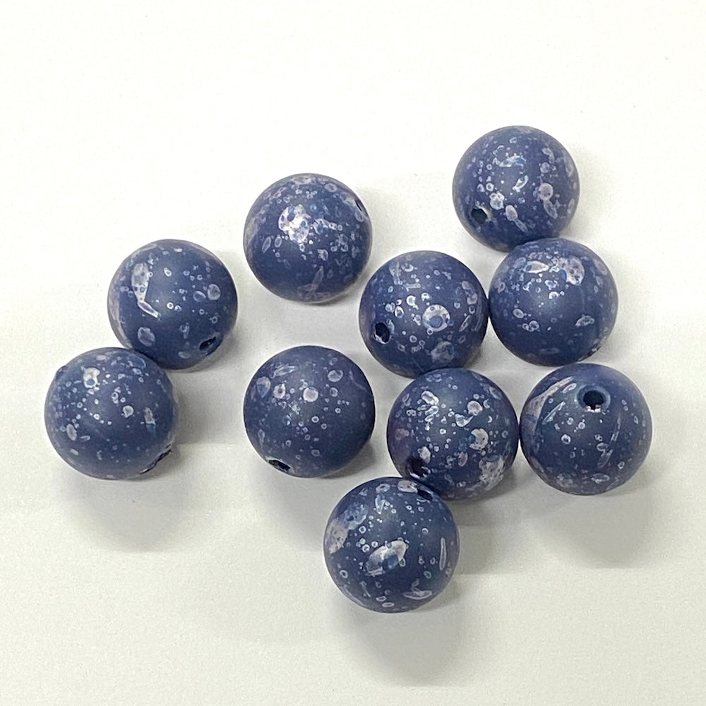 Blue marbled beads on a white background