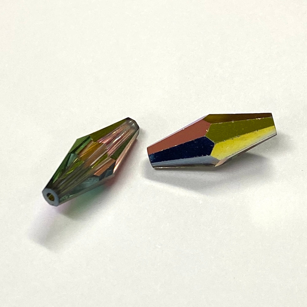 Two geometrically shaped beads on a white background