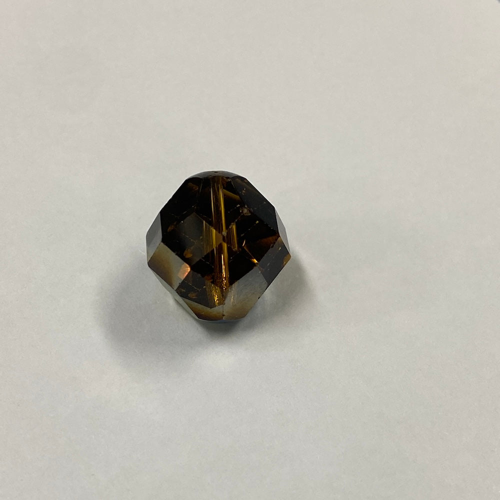 Faceted brown crystal beads on a light gray background