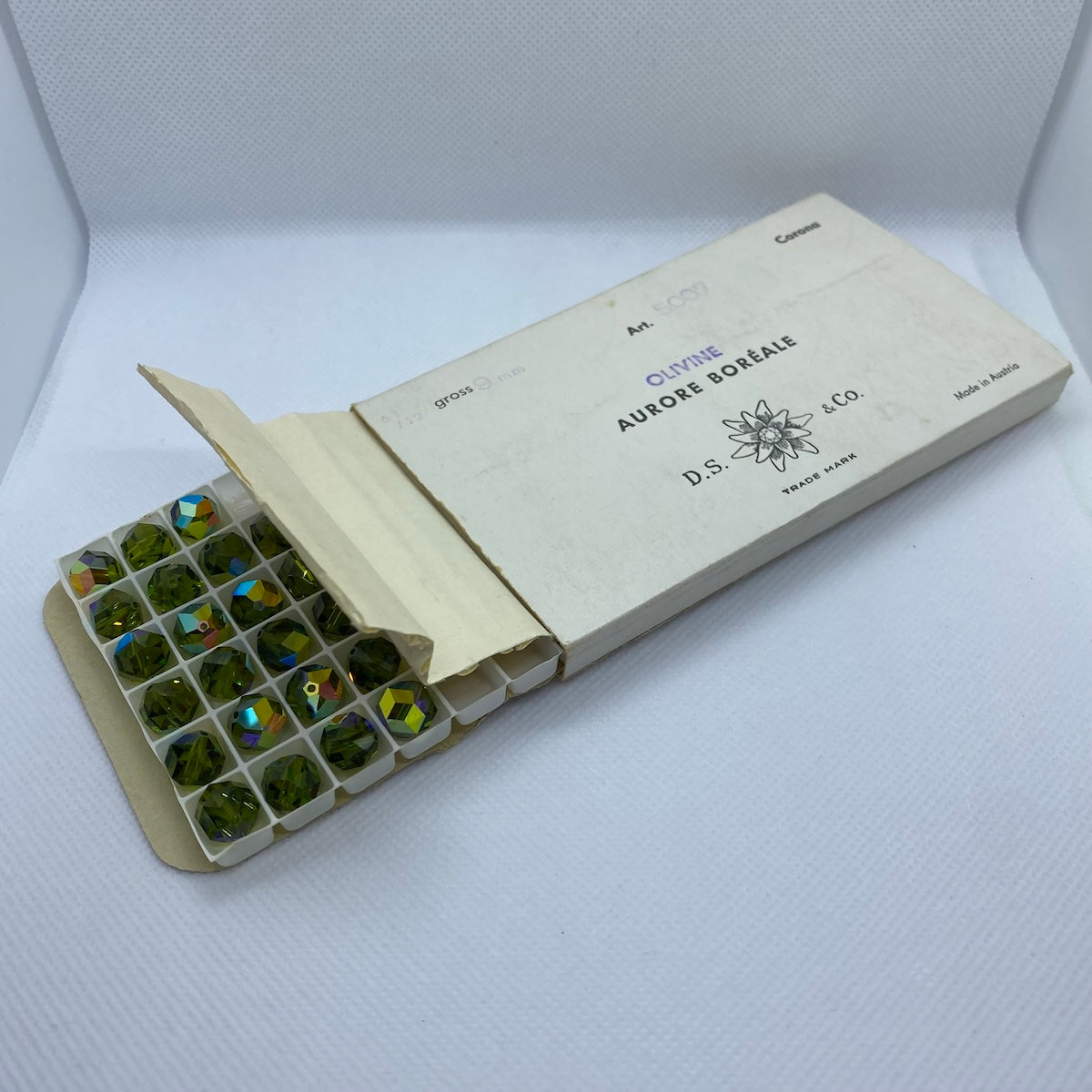 Art. 5007 Olivine AB 9mm (1) - Bead Shack