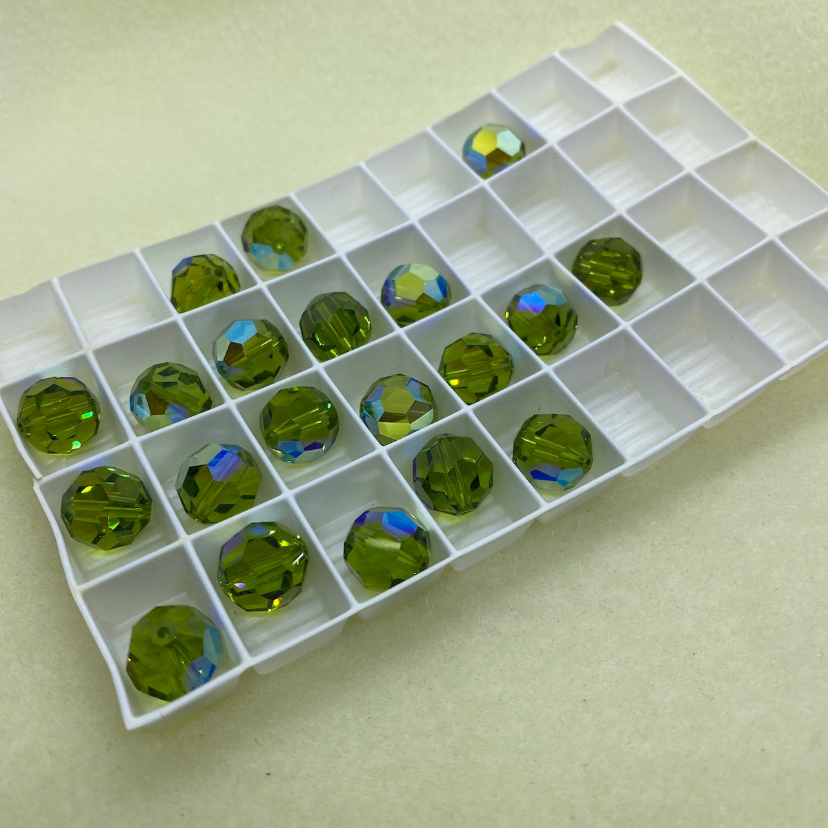 Art. 5000 Olivine AB 11mm Round (1) - Bead Shack