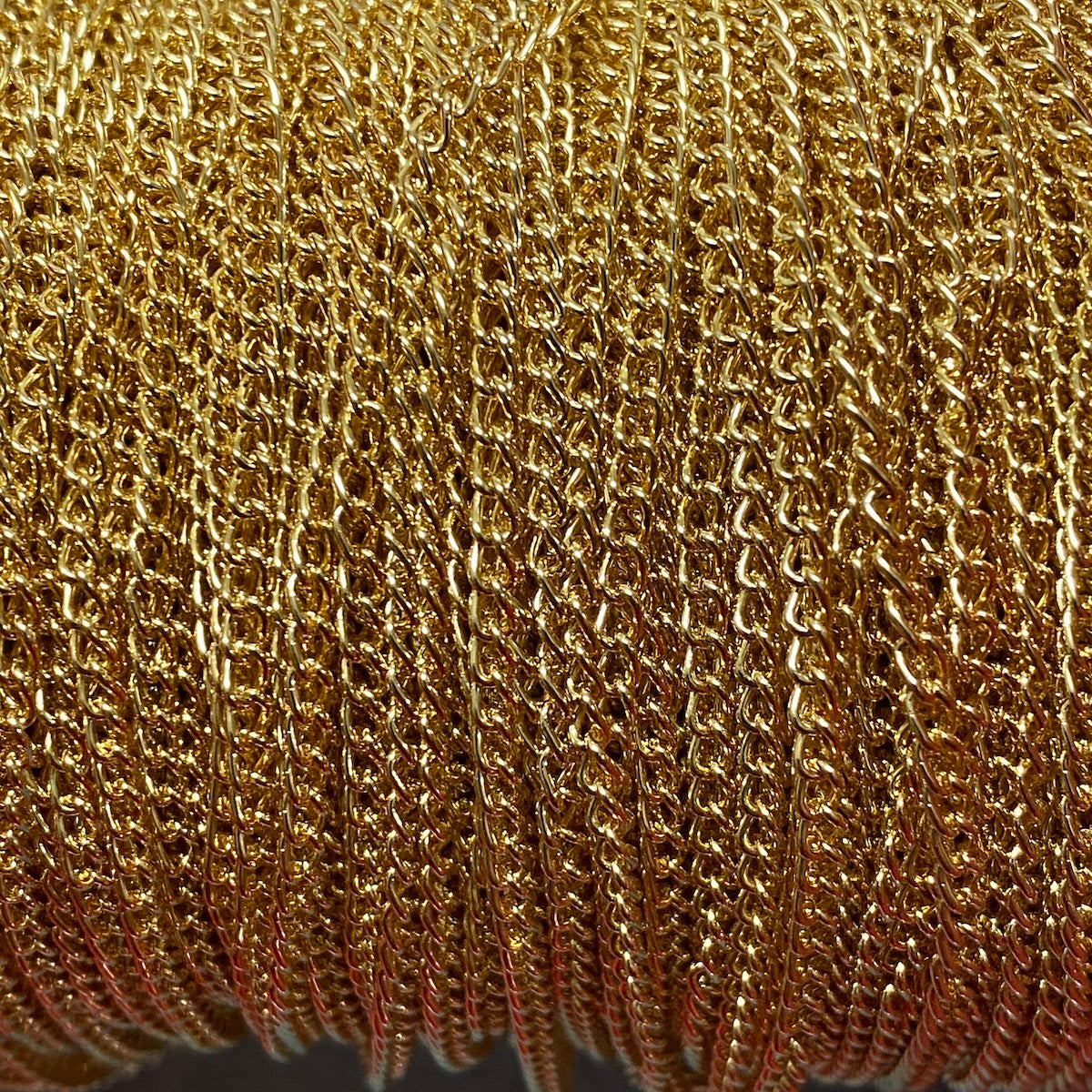 Close-up of a roll of gold linked chain
