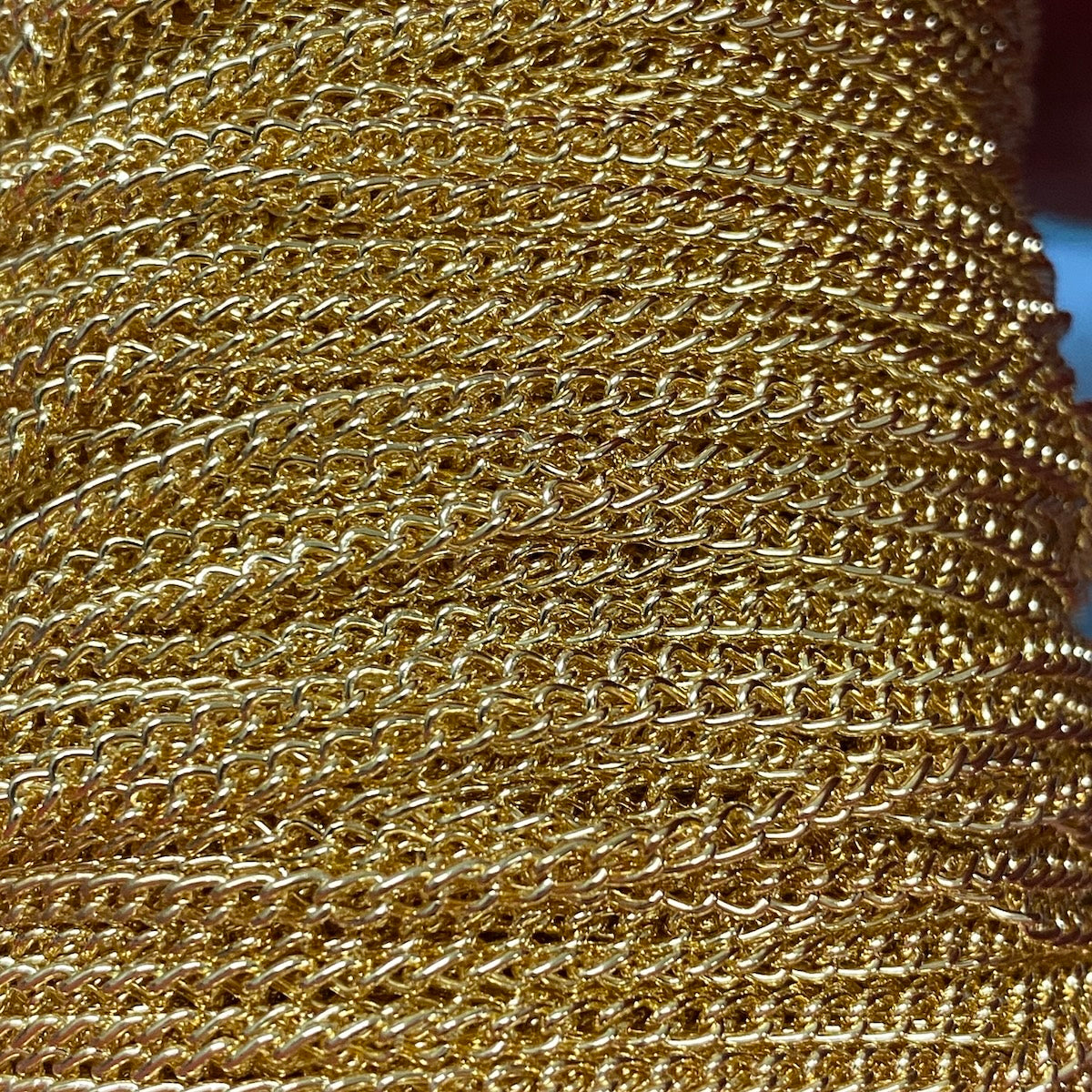 Close-up of a roll of gold linked chain