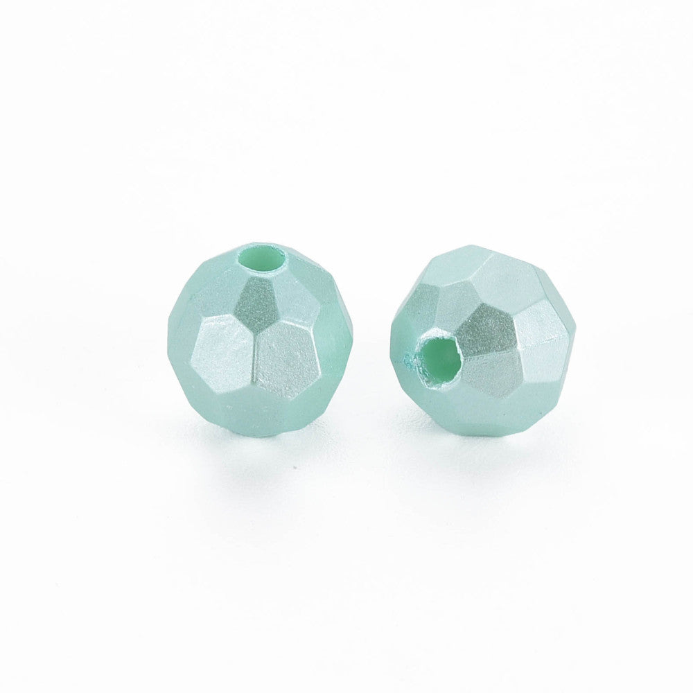 Two faceted mint green beads with a central hole, displayed on a clean white background.