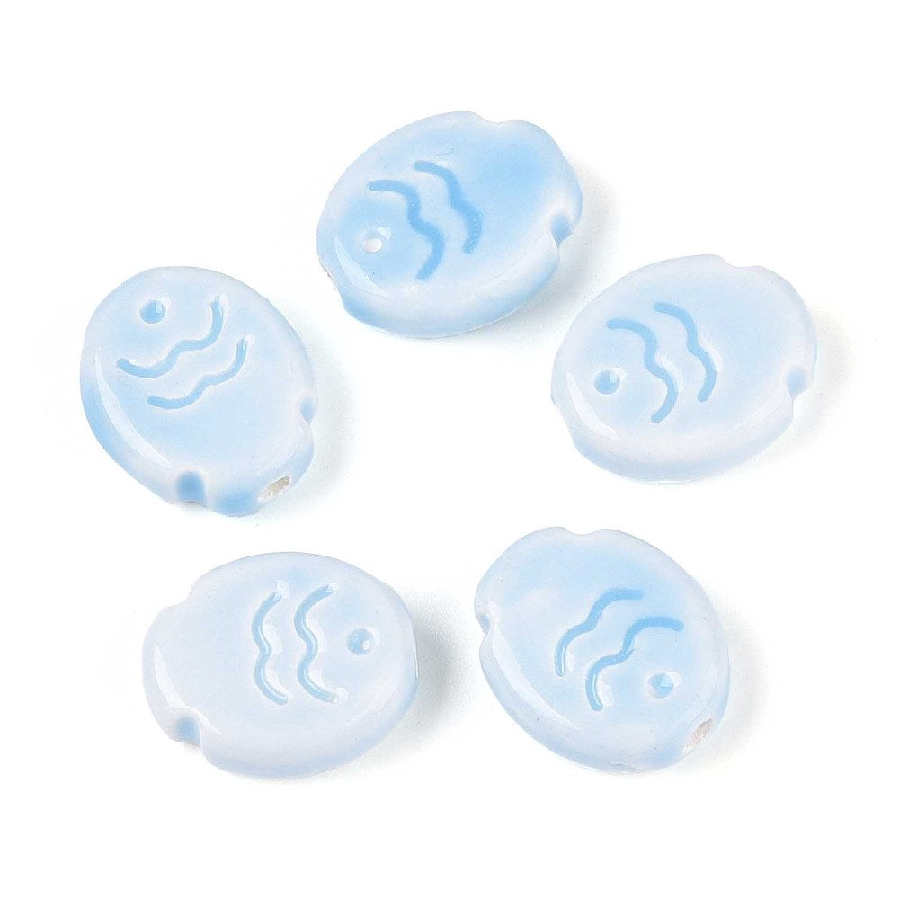 Five light blue fish ceramic beads with wave design on a white background