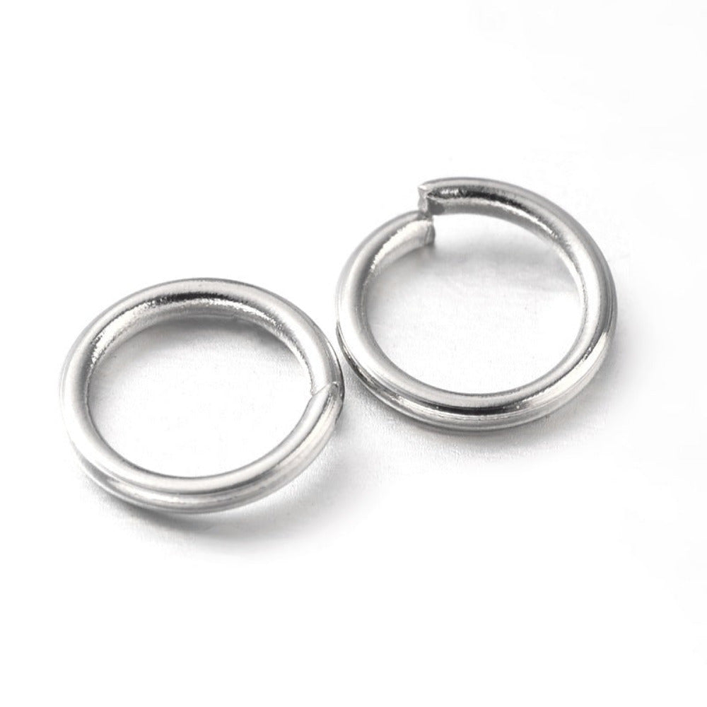 two small metal joining jump rings to connect jewelry and craft items with an anti tarnish finish