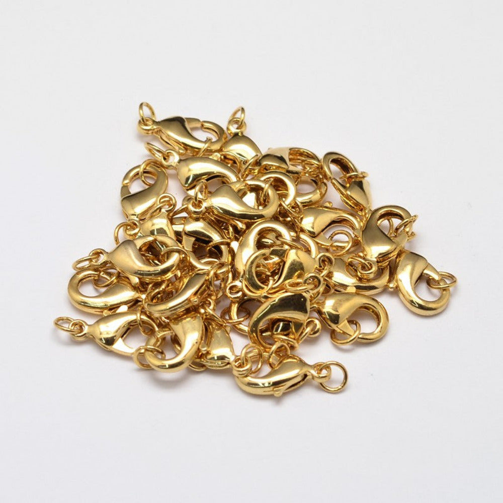 a collection of anti tarnish plated jewelry clasps with rings for the purpose of making a closure on a necklace or bracelet