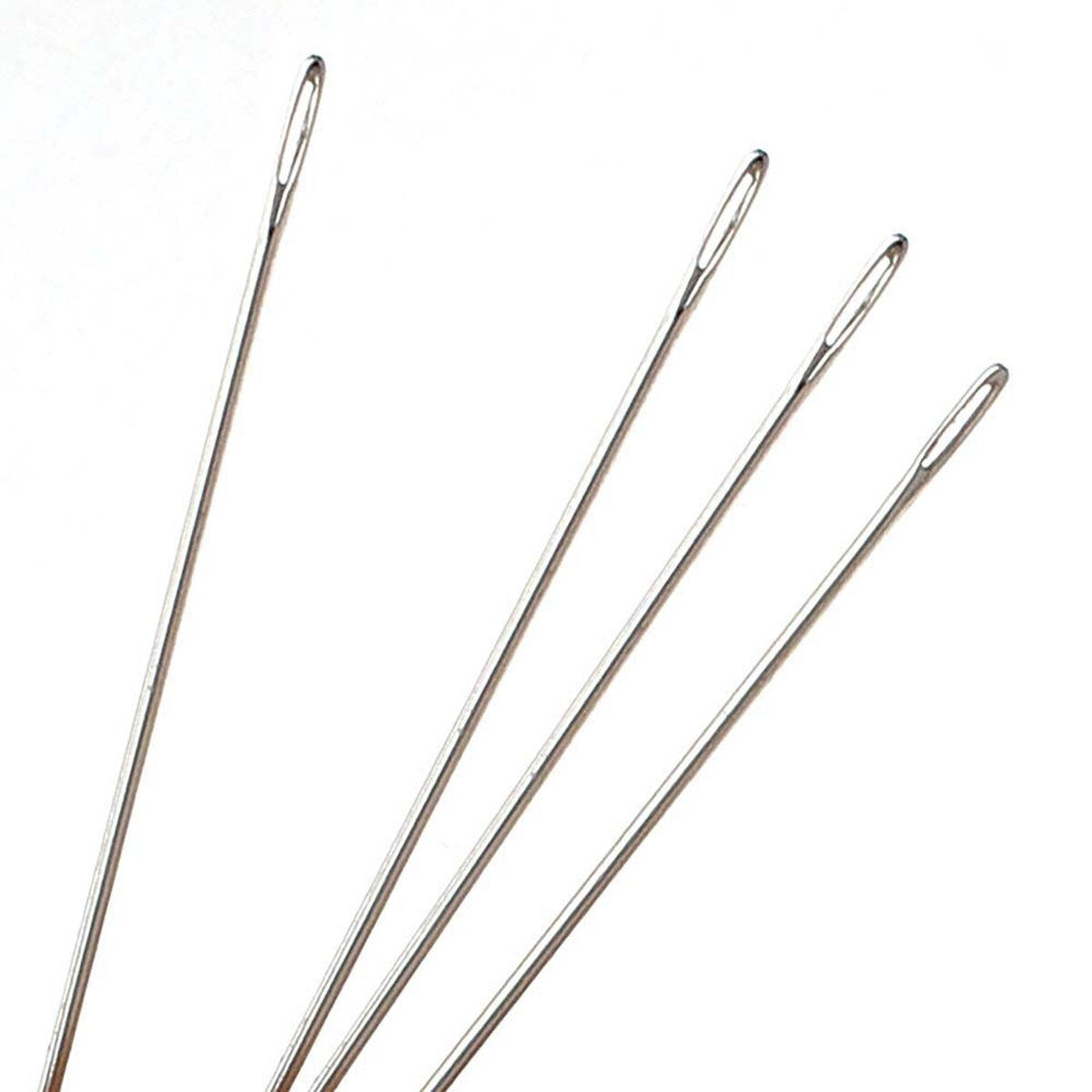 hard beading needles held on a white background showing the size of the threading holes