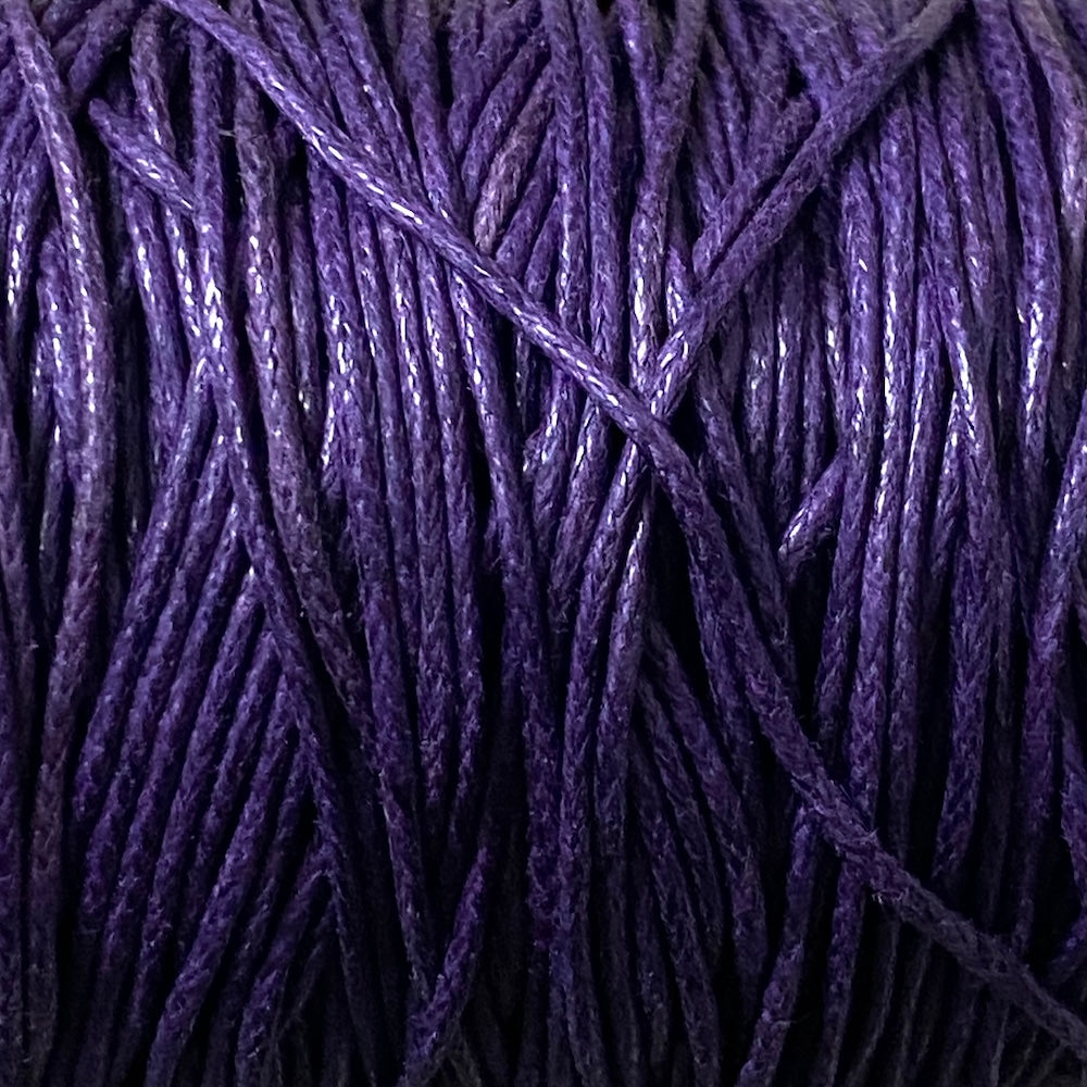 Close-up of purple wax cotton strands