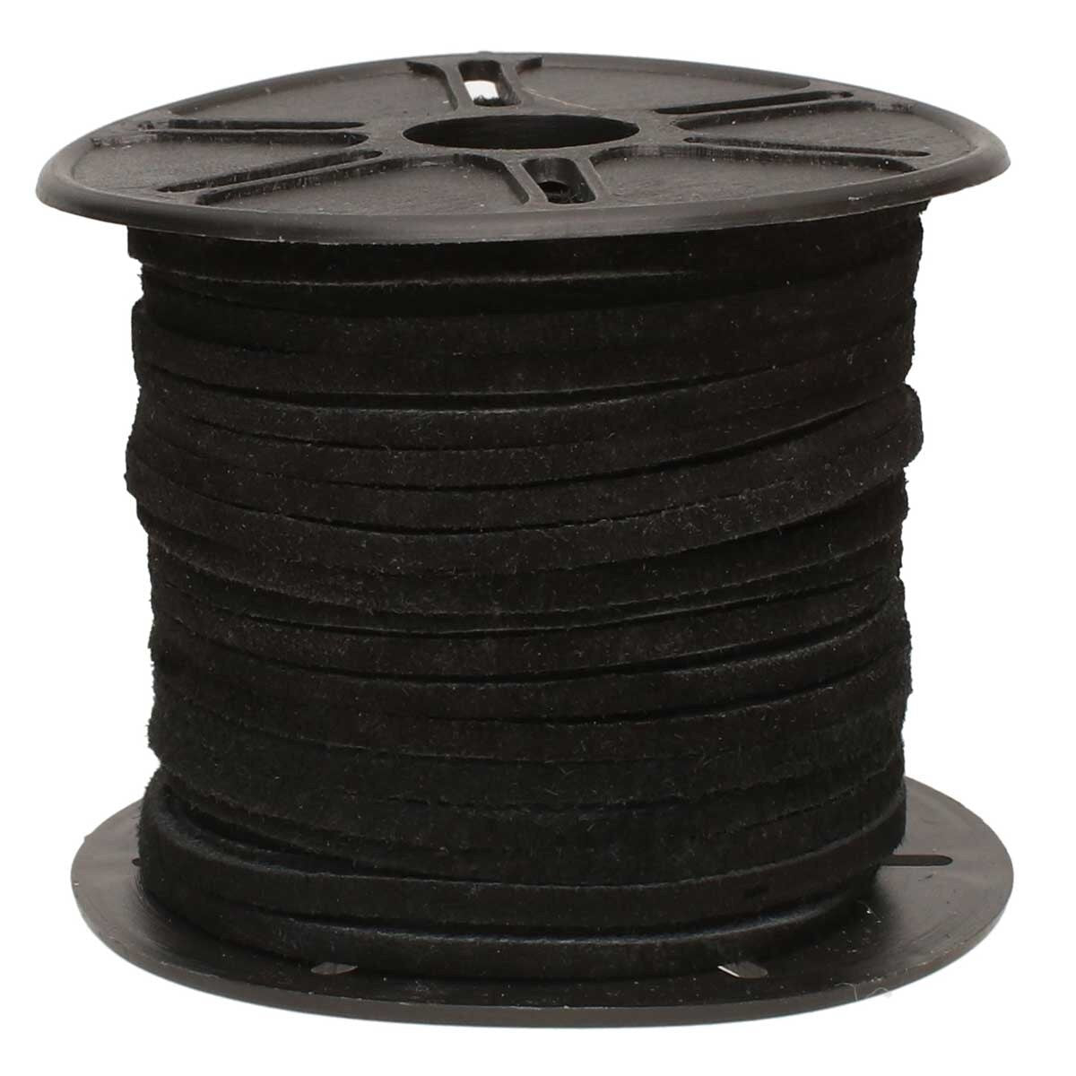 Spool of black suede leather on a white background