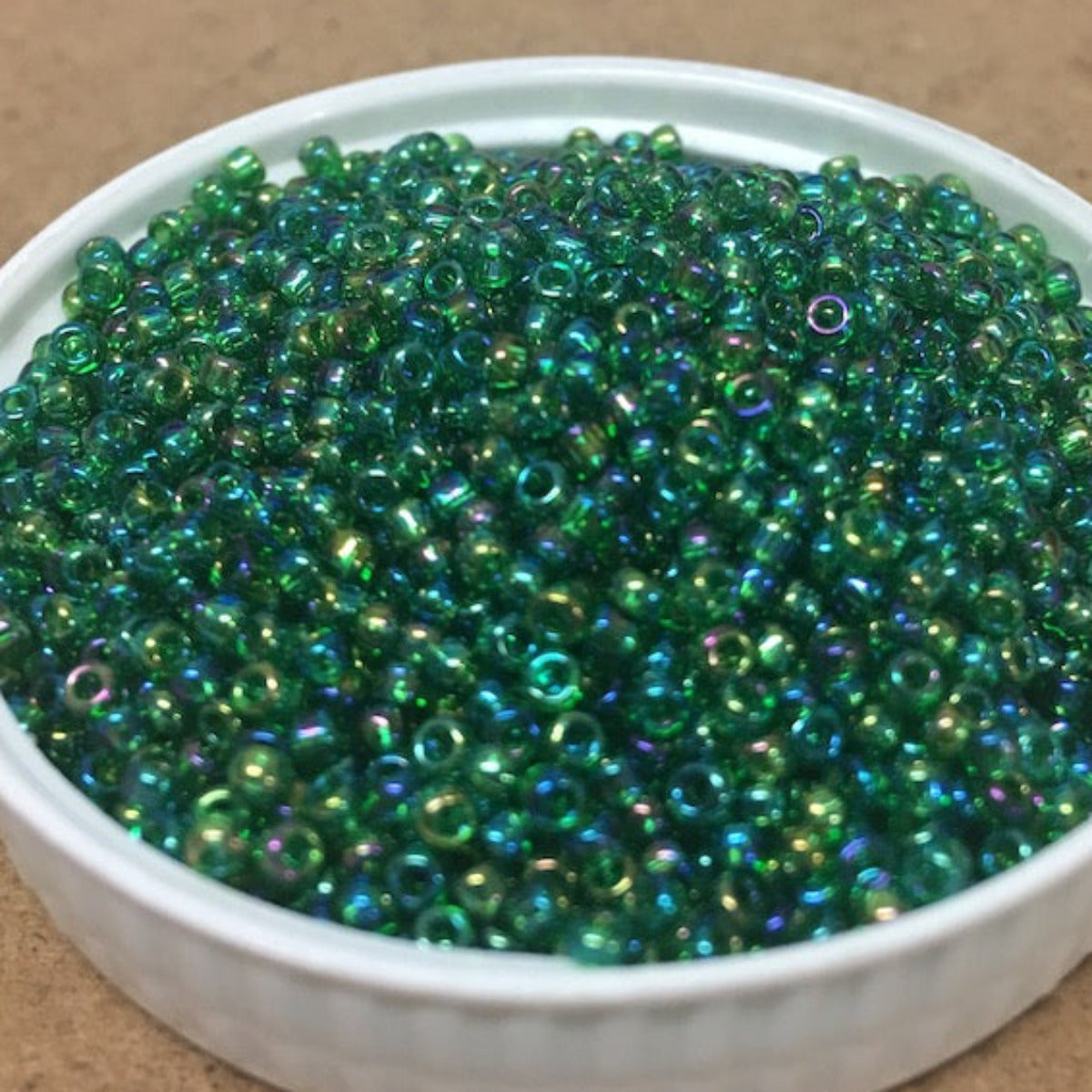 12/0 (#547) Transparent Emerald Rainbow - 24g Tube