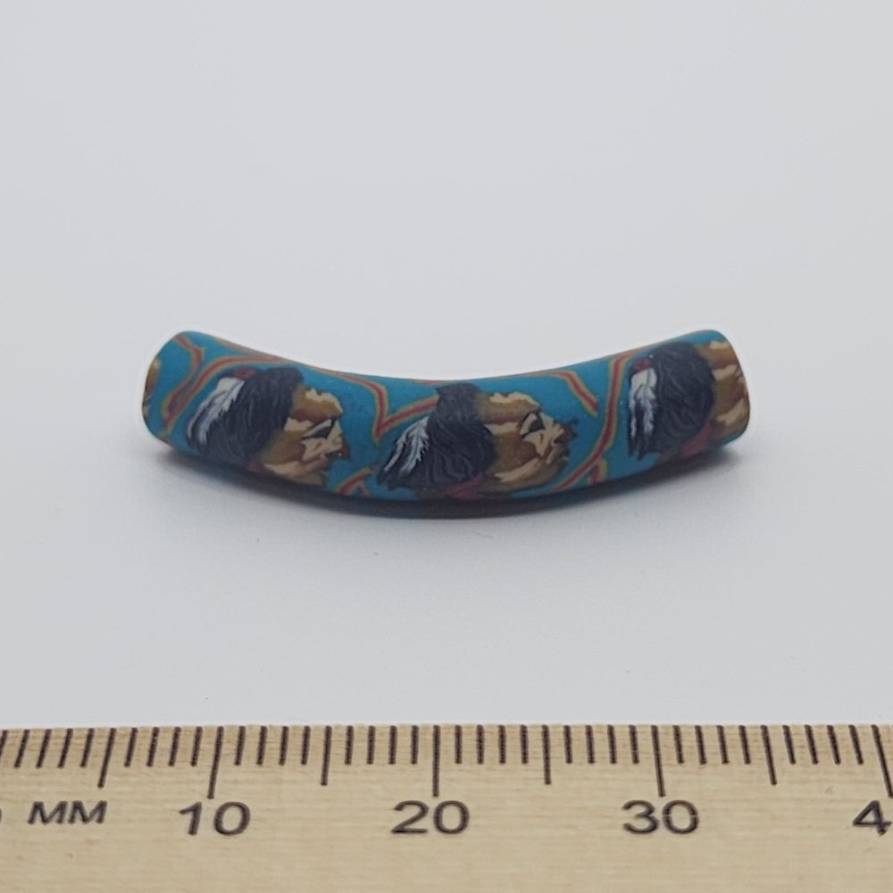 35x7mm Elbow Fimo Beads (10) - Indian Face w. Feathers