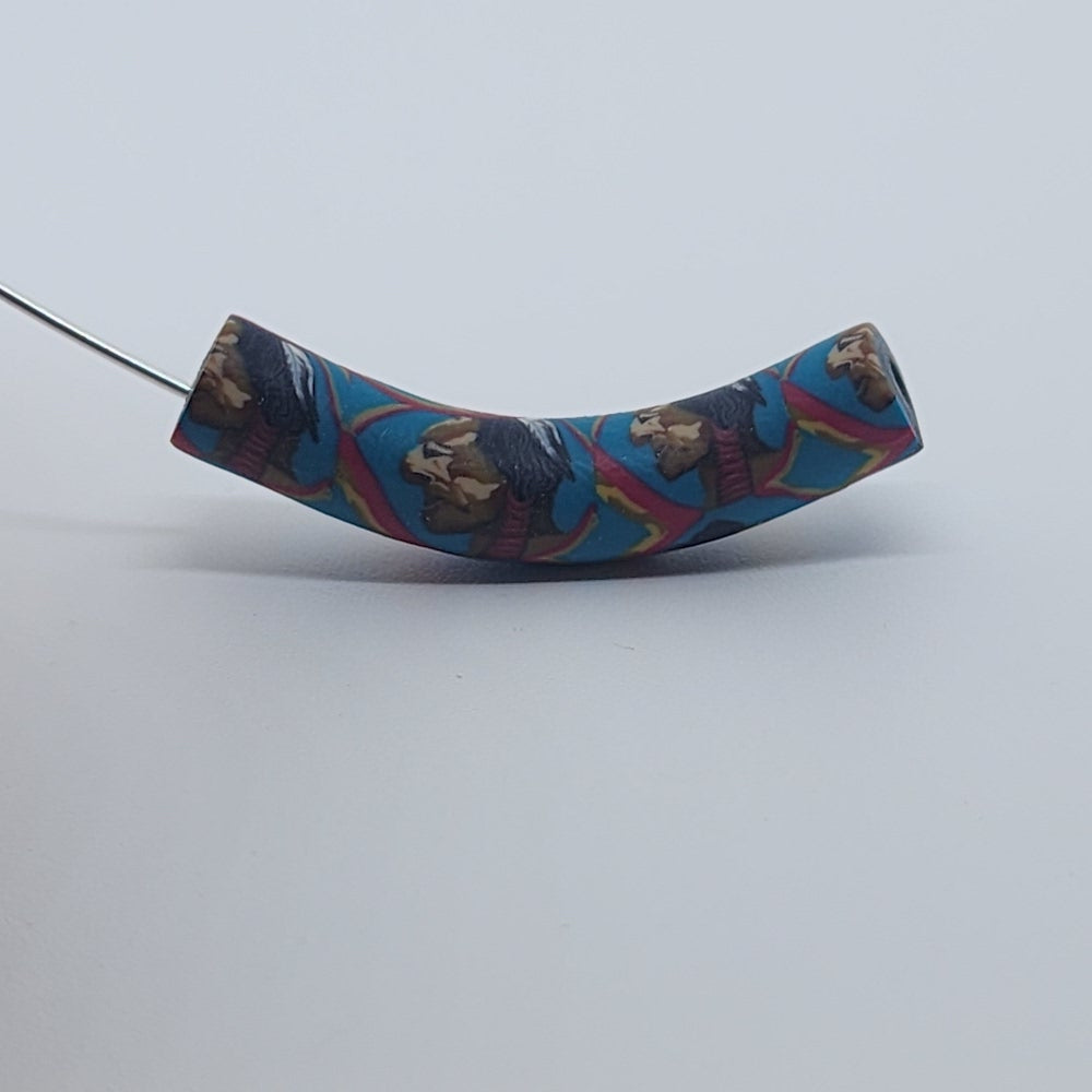 35x7mm Elbow Fimo Beads (10) - Indian Face w. Feathers