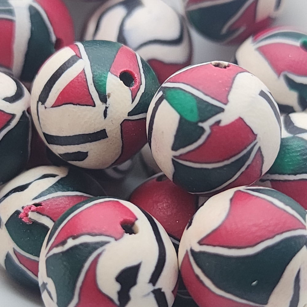 12mm Round Fimo Beads (10) - Red/Green Interlocking Triangles