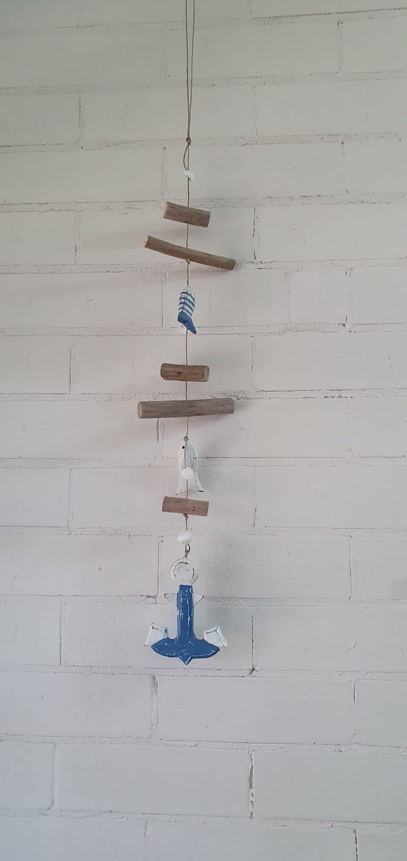 Sample of a hanging beaded decoration using wood, stones and beach themed wood decorations