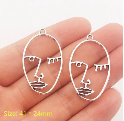 Abstract Face Pendant - Oval (1) - Silver