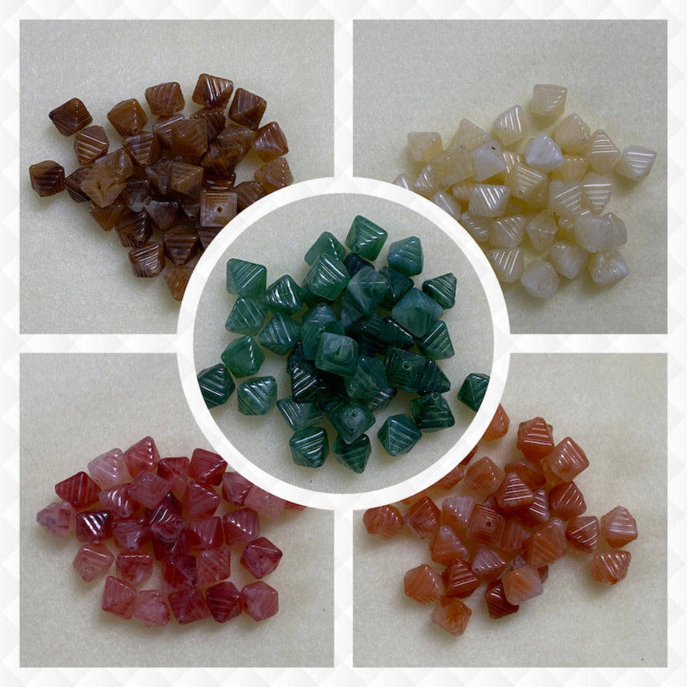A collage of five different colours of the same gemstone look style bead in small groups on a cream background