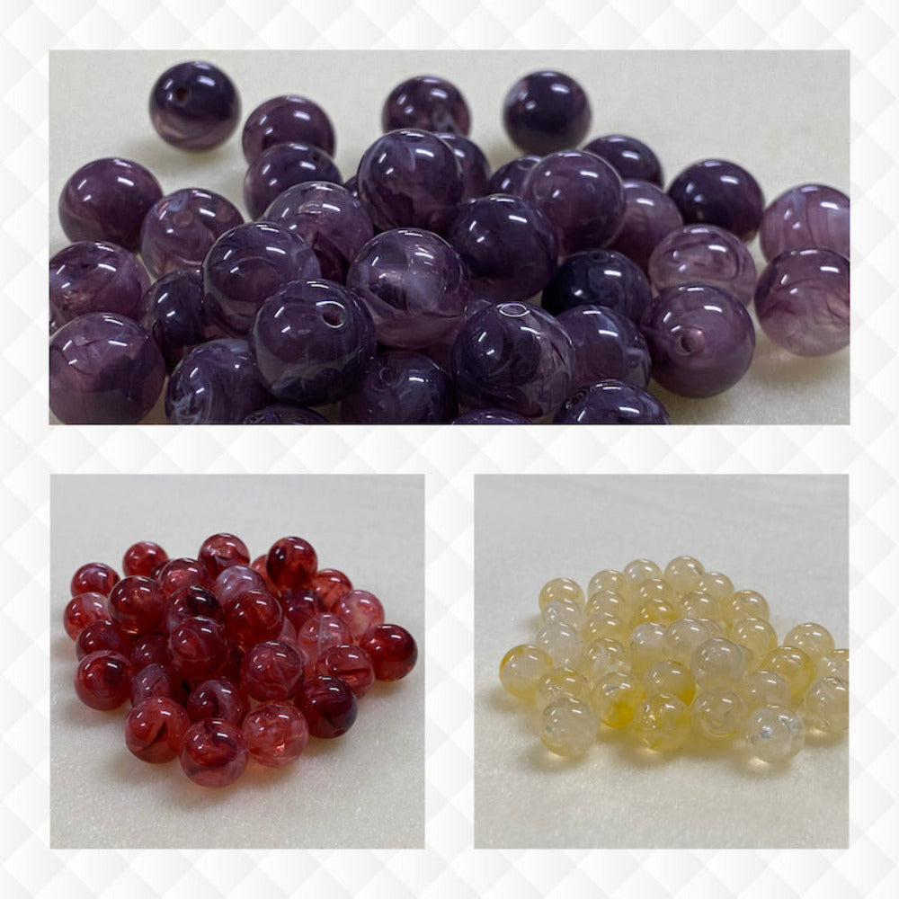 A collage of three different colours of the same gemstone look style bead in small groups on a cream background