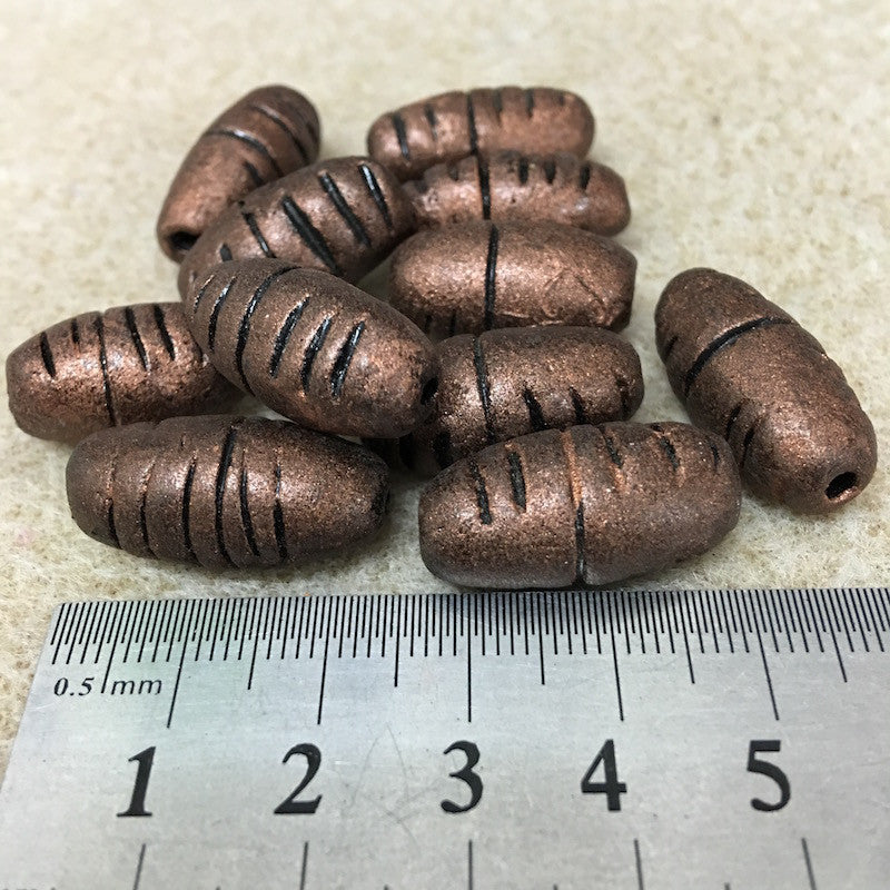 23x12mm Barrel Shaped w. Cuts (10) - Antique Copper - Vintage Clay Beads