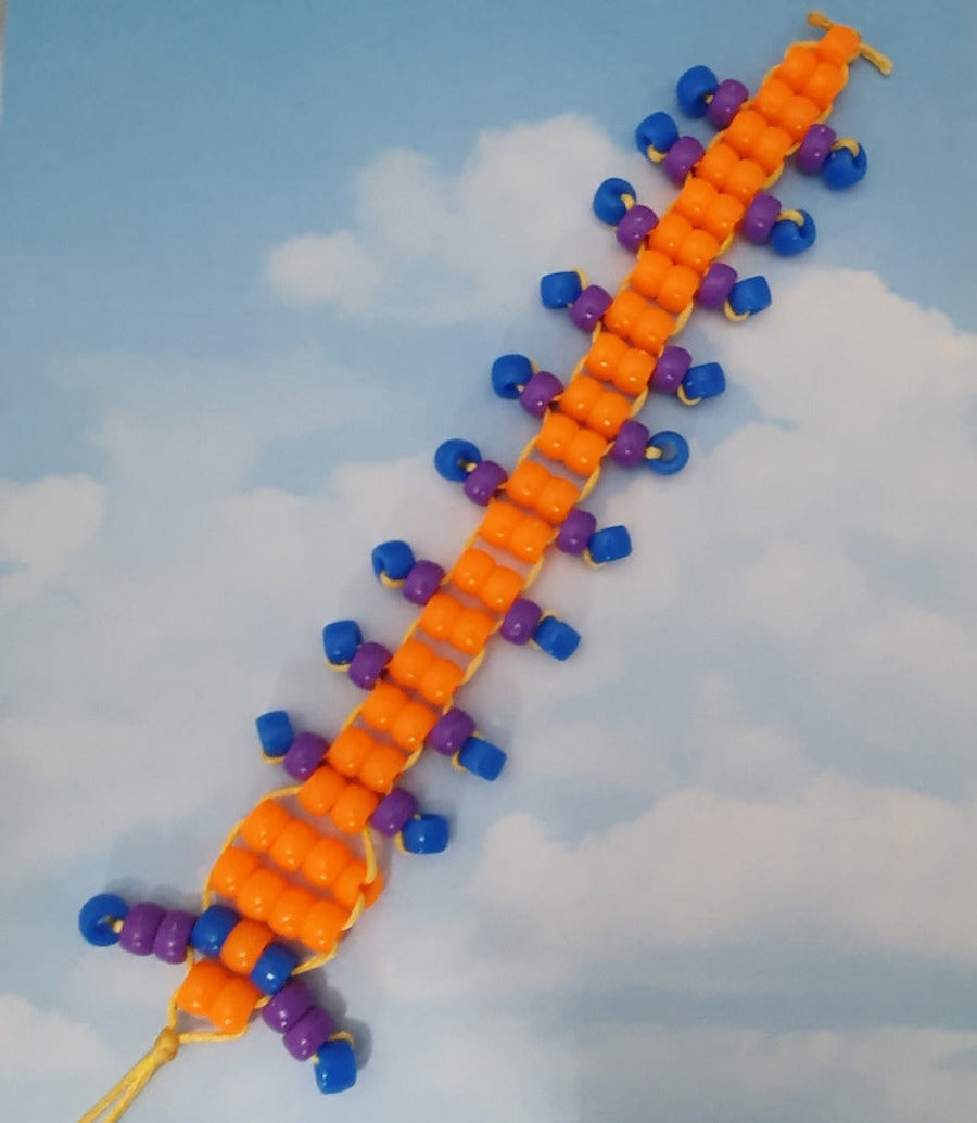 colourful beaded centipede toy made at Bead Shack snakes & lizard birthday party on a white background