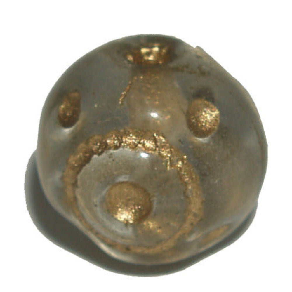 Decorative bead with gold accents on a white background