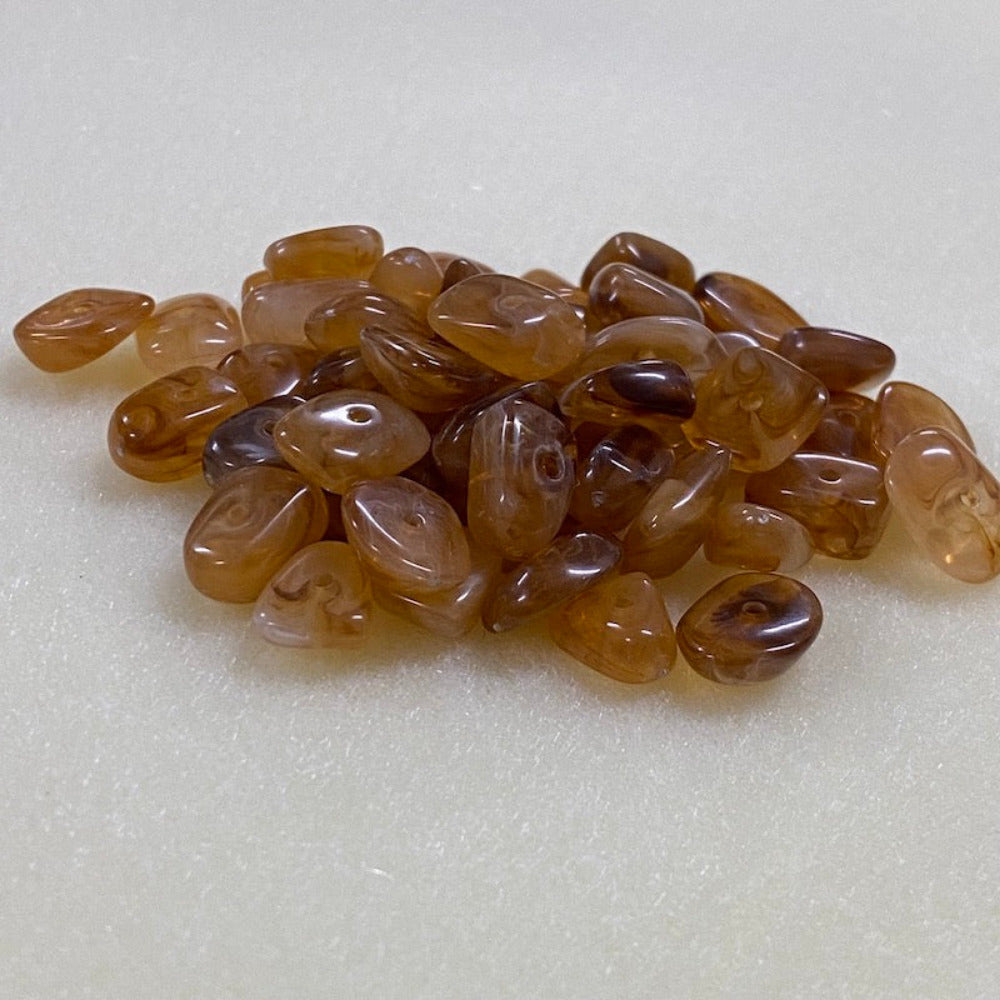 brown jasper gemstone look acrylic beads with visible threading holes for crafting jewelry