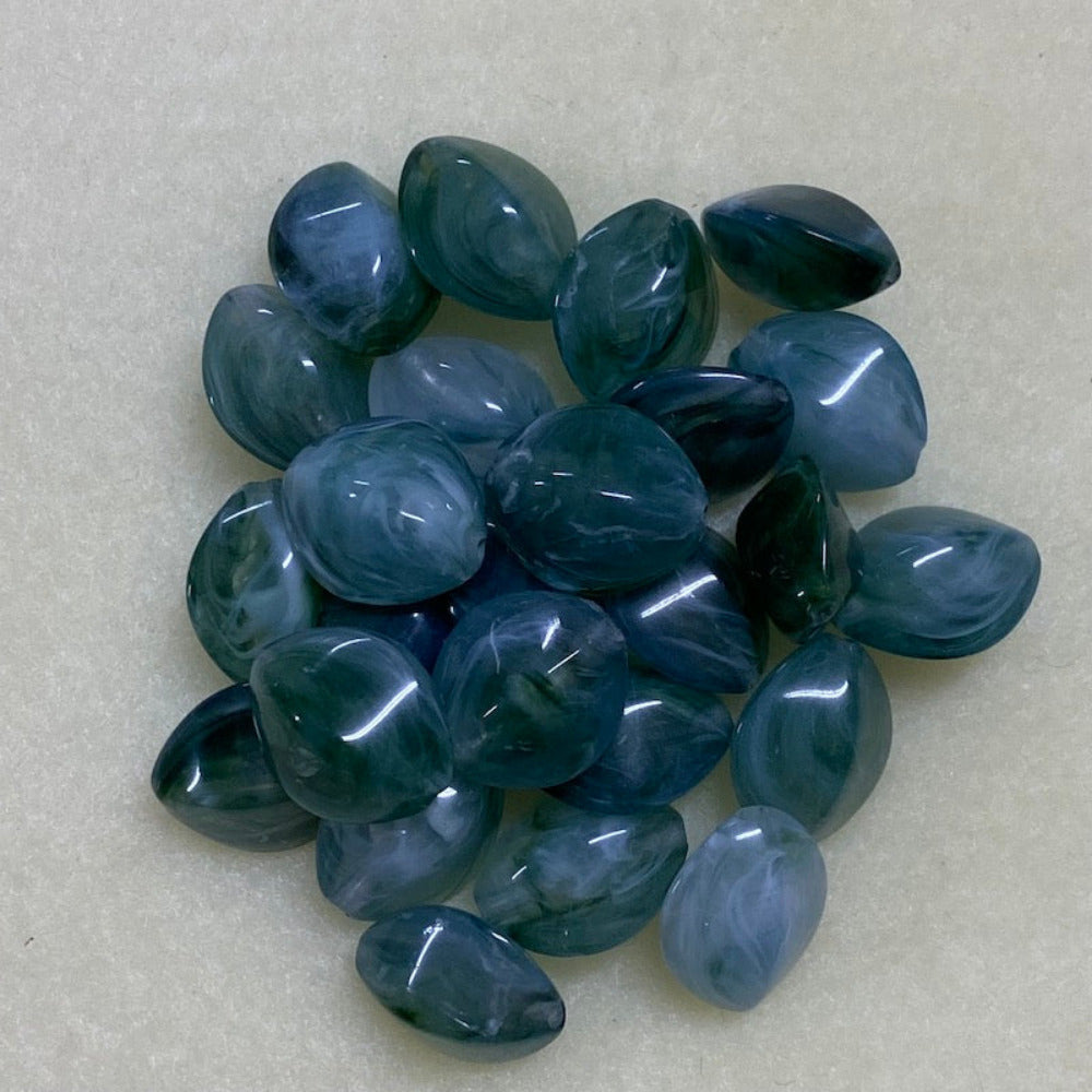 Jade green gemstone style acrylic beads with visible threading holes for crafting jewelry on a white background